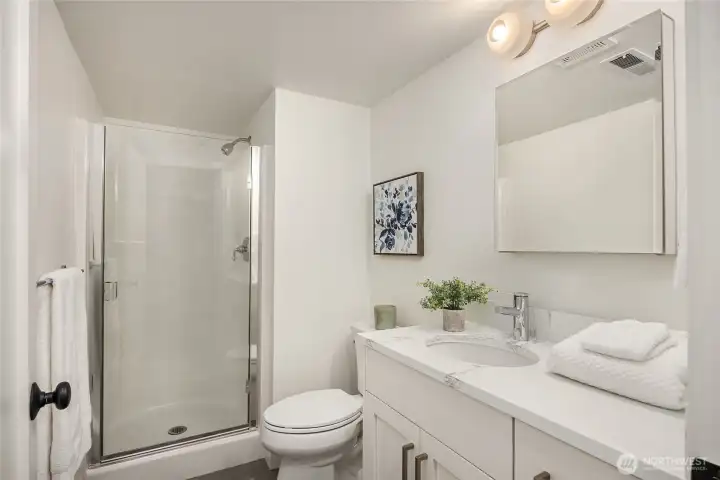 The 3/4 bath on the ground level of the home.