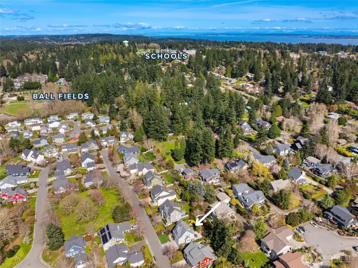 This aerial photo shows the home at mid-bottom, the Rotary Ball Fields to the north and the close proximity to Schools.
