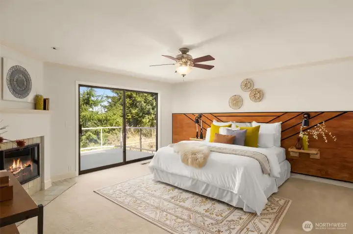 The main-level primary suite is a true retreat with private deck and custom headboard adding mid-century flair.