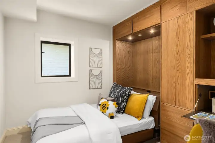 3rd bedroom with murphy bed and built-in desk.