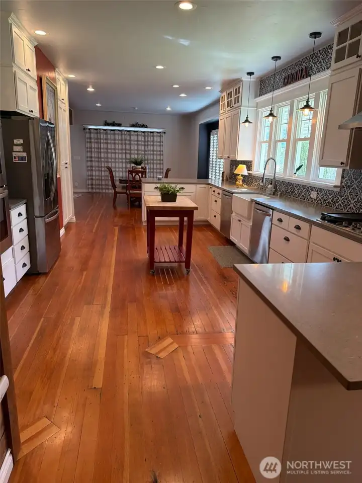 Love this kitchen, a sink a few dishwashers, double oven, view of the beautiful Mossyrock mountain range. Wow!!