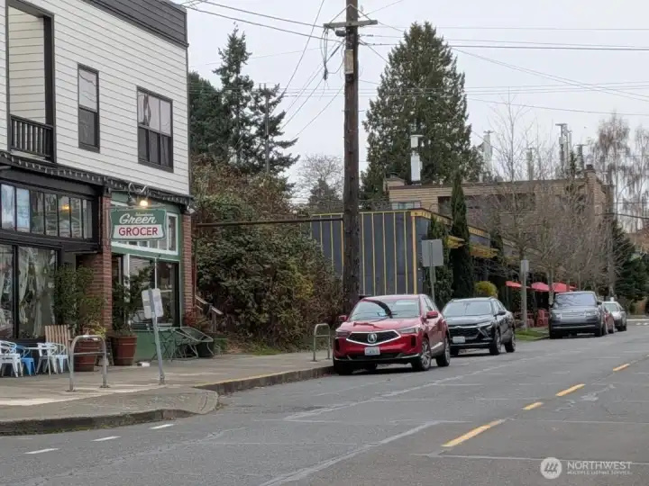 View up 32nd AVE NW from the office.  Green Grocer in corner building, Picolino's (coffee shop and restaurant) next building up.