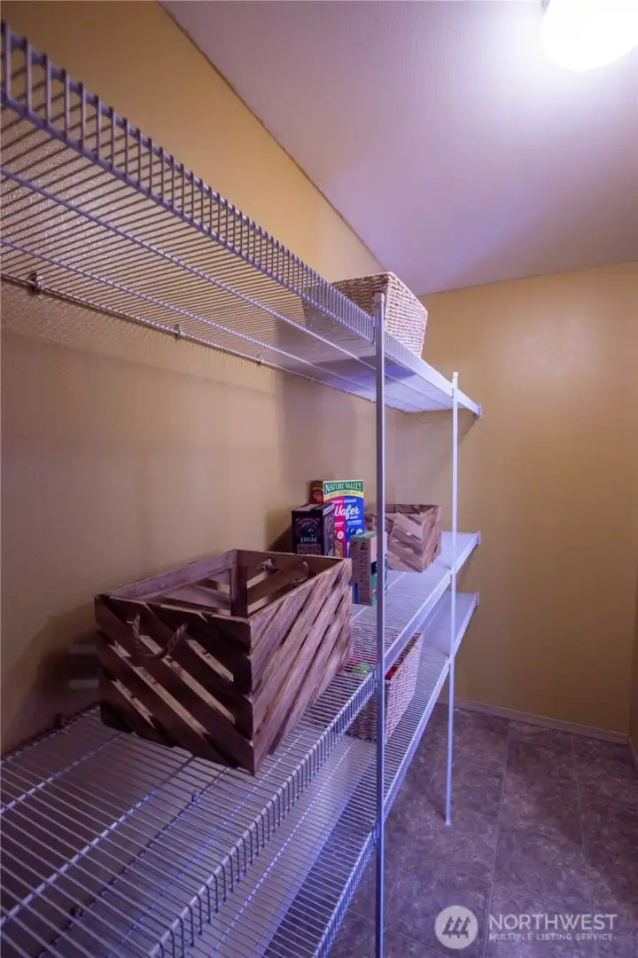 Another view of the walk-in pantry off the kitchen, again so much storage space.