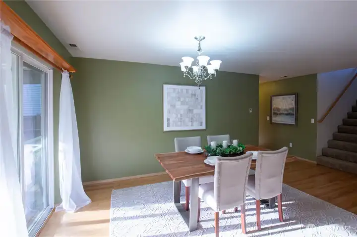 The large dining room flows between the living room and kitchen and is great for intimate dining or larger group dinner parties and entertaining.  The sider leads to the fully fenced back yard for privacy and outdoor enjoyment and entertaining,