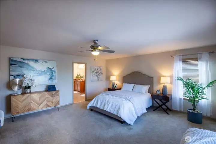 So much room in this primary ensuite with 5 piece bath and huge walk-in closet.