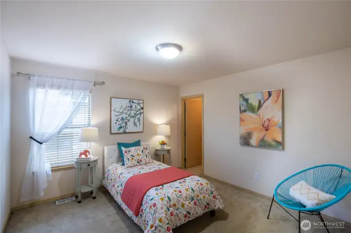The is upstairs bedroom 4, with a walk-in closet.