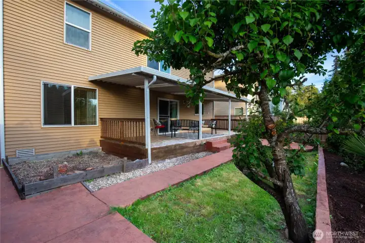 The fully fenced back yard is private and peaceful with large covered deck for outdoor living and entertaining.  Room for raised gardening,