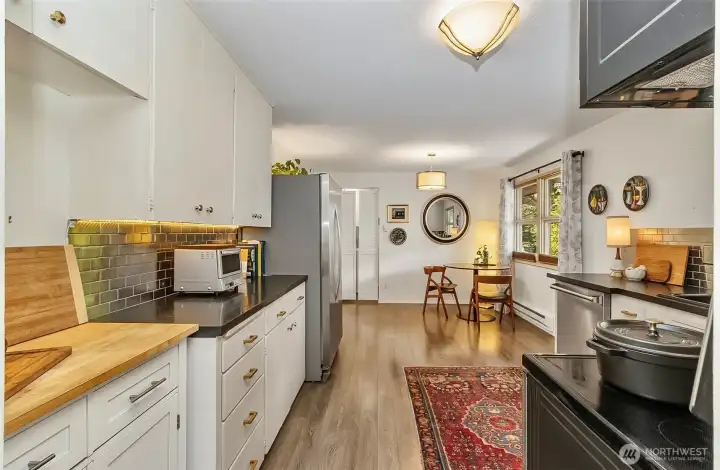 Entering the kitchen from hallway open concept with modern touches Entering the kitchen from hallway open concept with modern touches