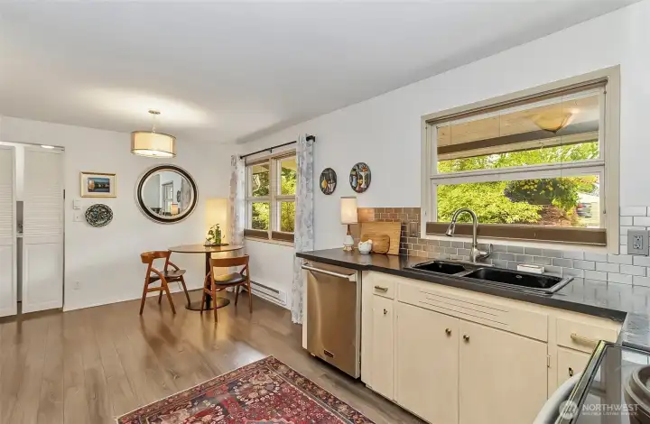 Dining area connected to the kitchen with great lighting and wonderful peaceful views Dining area connected to the kitchen with great lighting and wonderful peaceful views