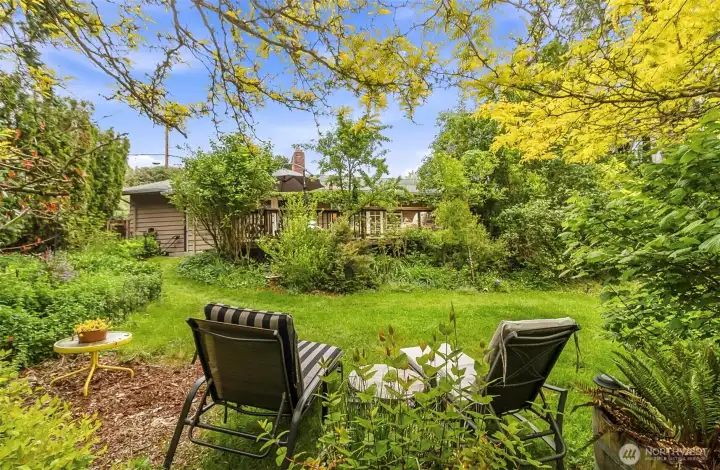 Sit in the yard in this retreat right in town and not even feel like your in town Sit in the yard in this retreat right in town and not even feel like your in town