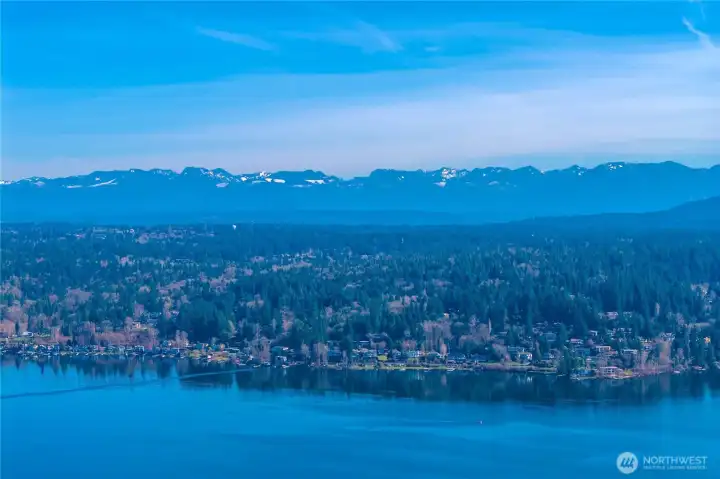 Sweeping Lake & mountain views set on a shy acre lot in Bellevue