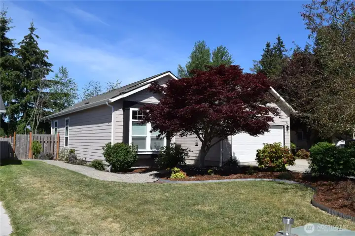 92 Sunset Meadows Lane.  Small yard and easy care Landscaping.