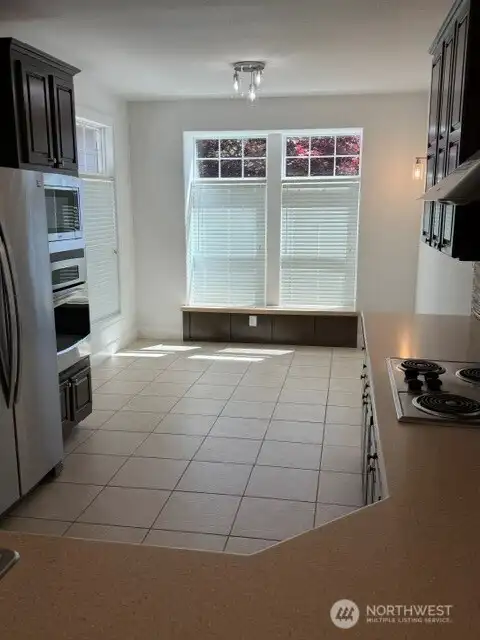 Kitchen/Dining space with window seats