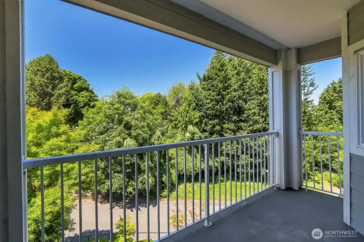 Welcome to this desirable corner unit that offers seamless indoor-outdoor living with a spacious covered deck overlooking serene surroundings. Welcome to this desirable corner unit that offers seamless indoor-outdoor living with a spacious covered deck overlooking serene surroundings.