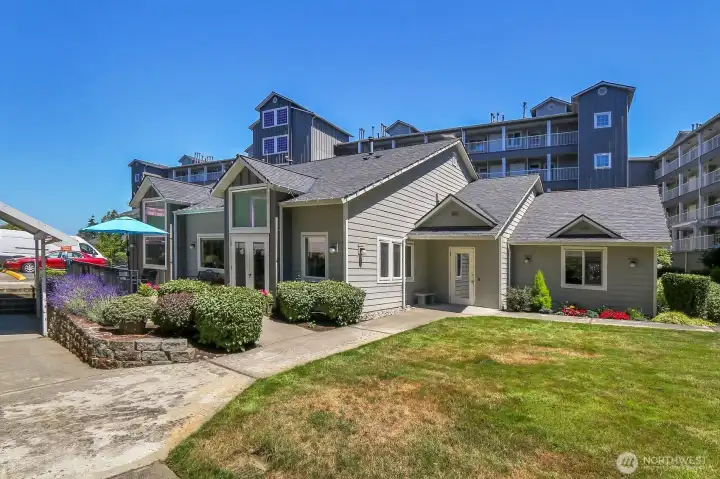 The Community Clubhouse has a library, exercise room, sauna, and entertaining space perfect for large gatherings. The Community Clubhouse has a library, exercise room, sauna, and entertaining space perfect for large gatherings.