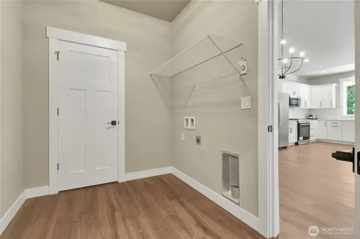 Coat rack and room for washer and dryer!