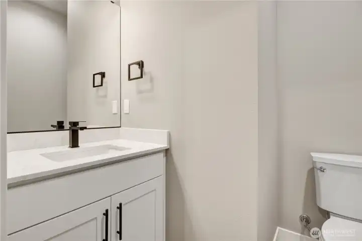 Perfect easy to access half bath for guests and working in the garage or outside so there is no tracking in the mess around the house!