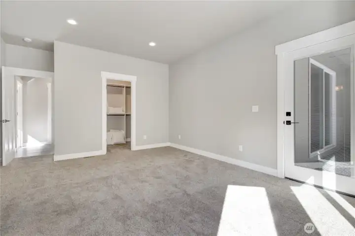 walk in closet is fully fitted with luxury closet fittings