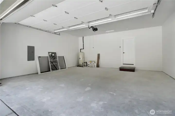 garage space is drywall with paint and classic layout!