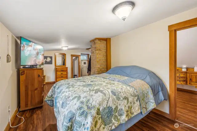 Another view of the primary bedroom. The 3/4 bath is through the doorway to the right.