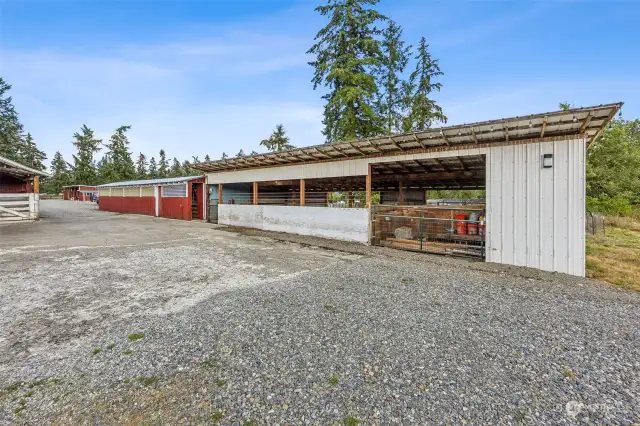 This entire building spans 98'x20' with both the red and white barns combined. The red portion is 50'x20' with 5 stalls and run outs. Please see the attached listing supplements and/or 3D tour for additional details and photos.