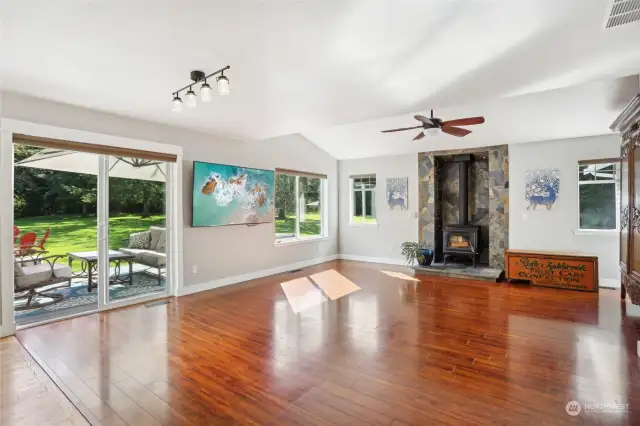 The beautiful wood floors and high ceilings give this room a very spacious feeling. The sliding door give the freedom of extended living quarter in the warmer season.