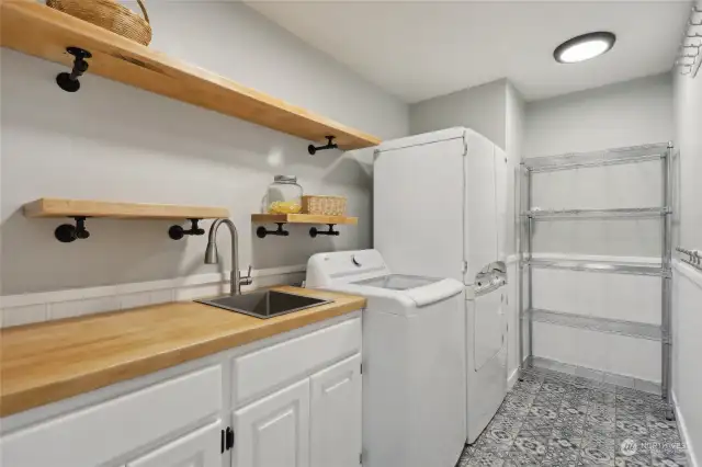 Beautiful spacious laundry room built for convenience.