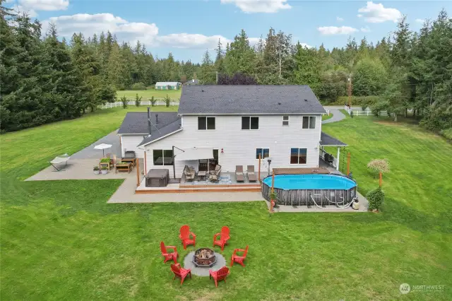 See that pool? That can be yours! Imagine hot summers by the pool and the cool fall and winter seasons curled up by the fire roasting smores or hot dogs.