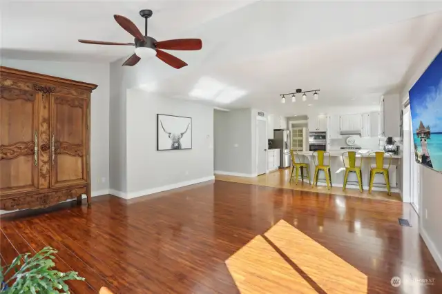 The large family and kitchen provides ample space. The open concept and natural light give this area a peaceful yet cozy feeling.