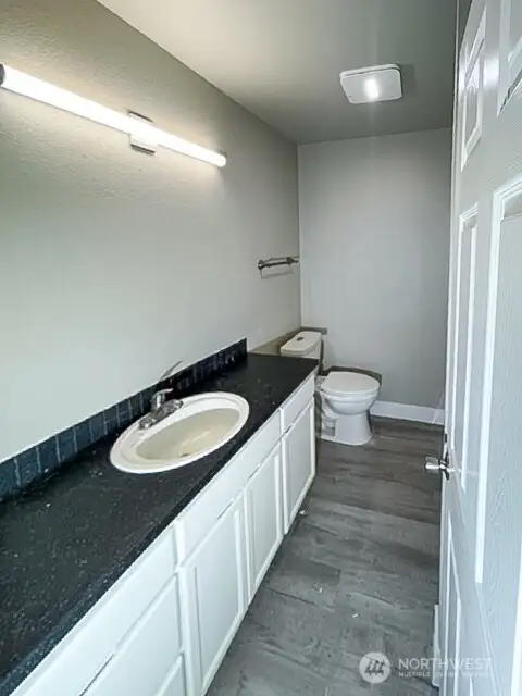 Unit A full bathroom upstairs.