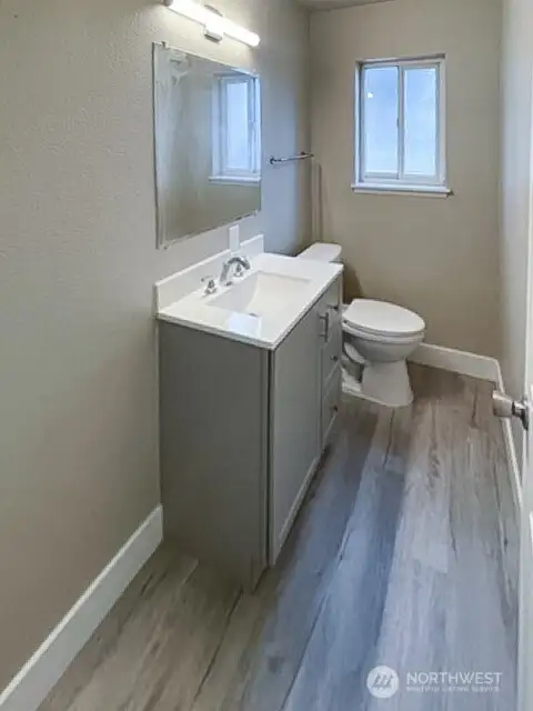 Unit A half bathroom on the main level.