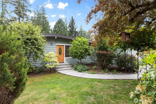 Lush gardens create a private sanctuary.