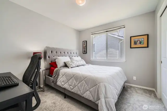 The 2nd bedroom is large too! A queen bed & a desk with lots of extra room to spare!
