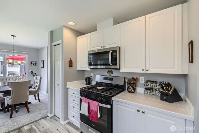 The kitchen & dining room lead to the deck through sliding glass doors.