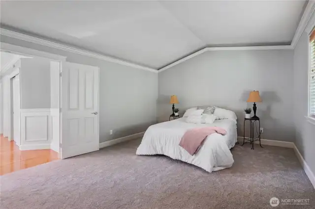 Primary suite with vaulted ceilings.