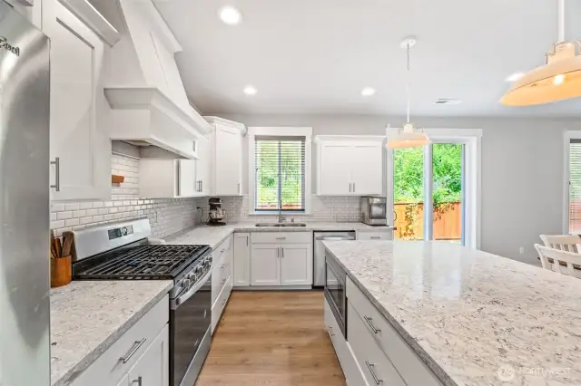 Huge kitchen island with built in microwave.