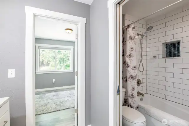 Upper floor full bathroom with seperate tub and toilet.