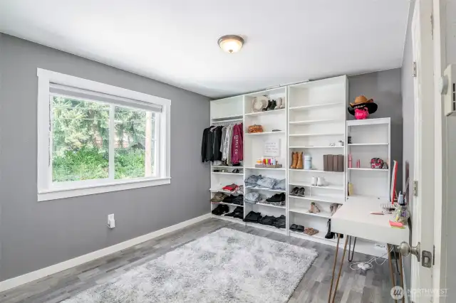 Upper floor secondary bedroom. Shelves are removable.