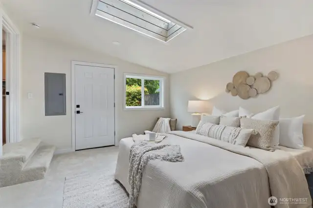 Vaulted ceilings, skylight and own entry door