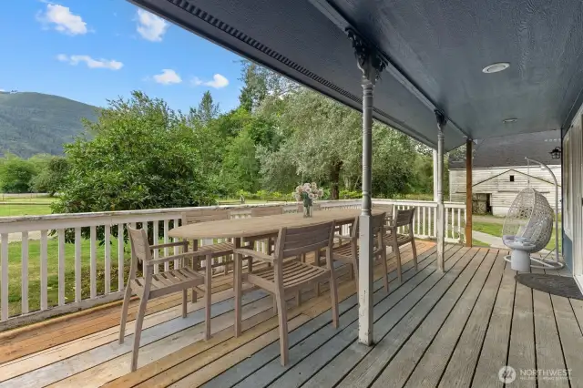 Large deck off of the family room w/ steps down to the yard. Virtually staged.