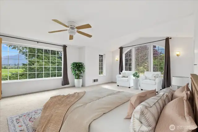 Upstairs bedroom #4 the primary suite w/ sitting area, private bath & lg walk-in-closet. Virtually Staged.