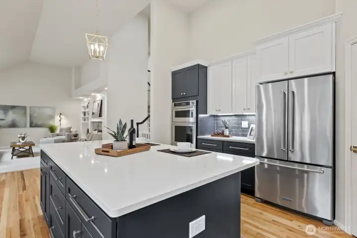 Stainless steel appliances including microwave and wall oven.