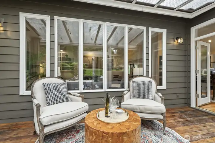 Located off the kitchen and primary suite.