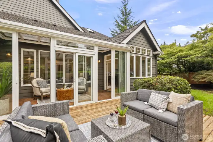 3 sliding doors open onto the deck and backyard.
