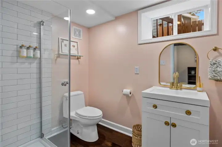 Bathroom 2 on the lower level is newly constructed. It featuers a nice glass shower.