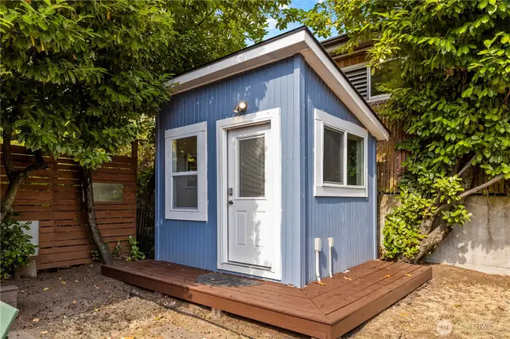 The detached office-she-he-they-shed is fully insulated, powered, heated and has ethernet. The perfect separate space!