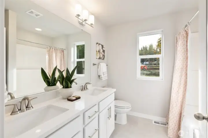Pictures of same floorplan at different site. Specs/finishes differ.