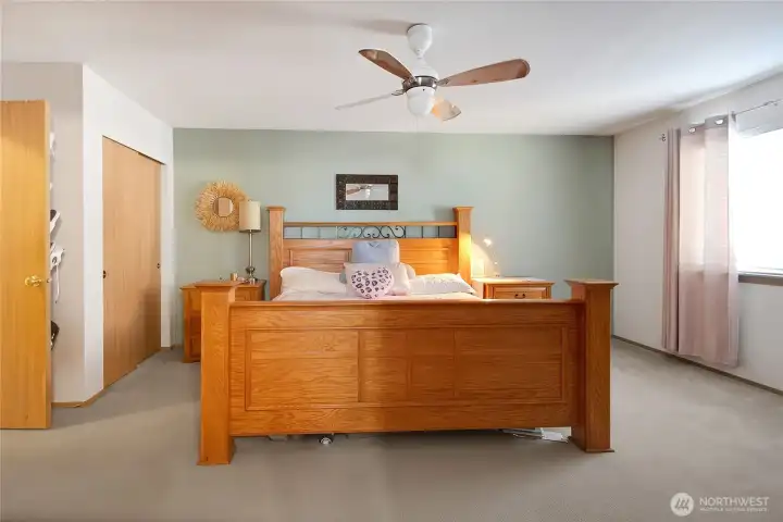 The primary bedroom with walk in closet and primary bath are a treat!