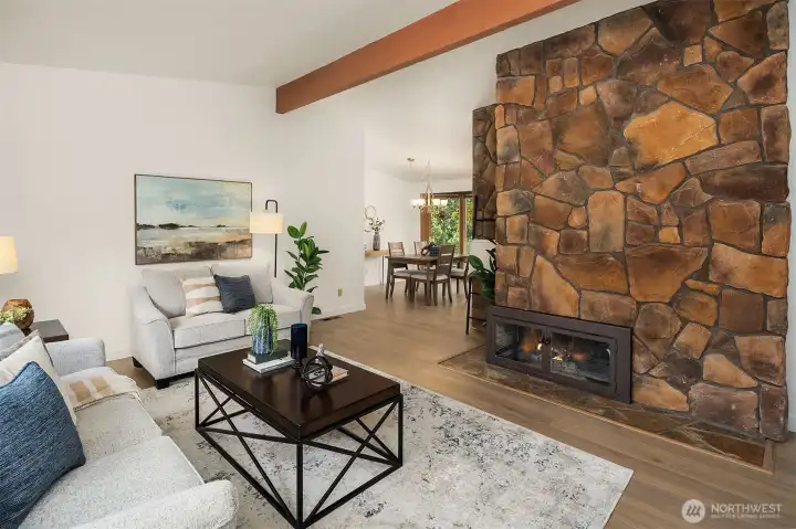 Floor to ceiling stone fireplace