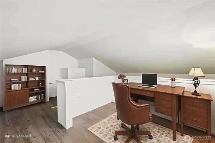 Cozy loft above bonus room- great for a home office!